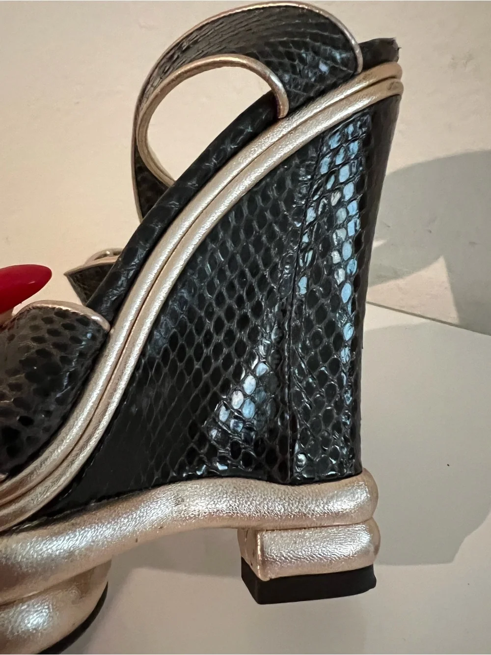 Dolce & Gabbana Black Snakeskin Wedge Sandals with Gold Accents..